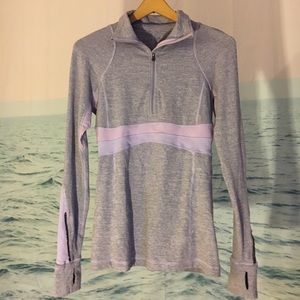 Lululemon purple jacket with thumb holes.